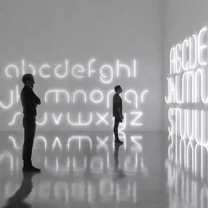 Artemide Alphabet of Light applique minuscule m^ Design
