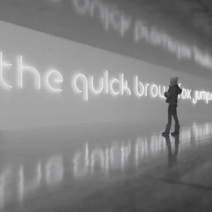 Artemide Alphabet of Light applique minuscule m^ Design